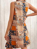 Jacinta - Sukienka mini bez rękawów w stylu retro z patchworkiem kwiatowym