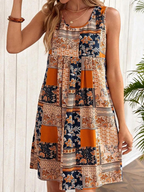 Jacinta - Sukienka mini bez rękawów w stylu retro z patchworkiem kwiatowym