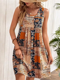 Jacinta - Sukienka mini bez rękawów w stylu retro z patchworkiem kwiatowym