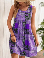 Jacinta - Sukienka mini bez rękawów w stylu retro z patchworkiem kwiatowym