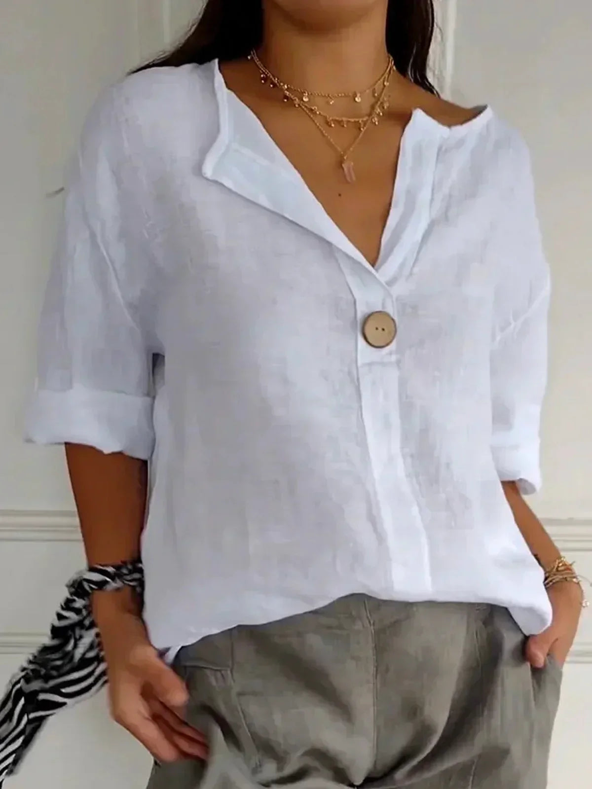 Aveline - Casualowa bluzka z dekoltem w serek (dostępny również w rozmiarze plus size)